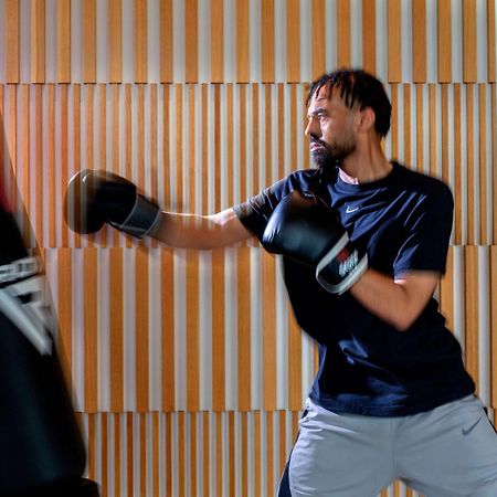 Hyatt Regency Riyadh Olaya Ngoại thất bức ảnh A boxer training with a heavy bag
