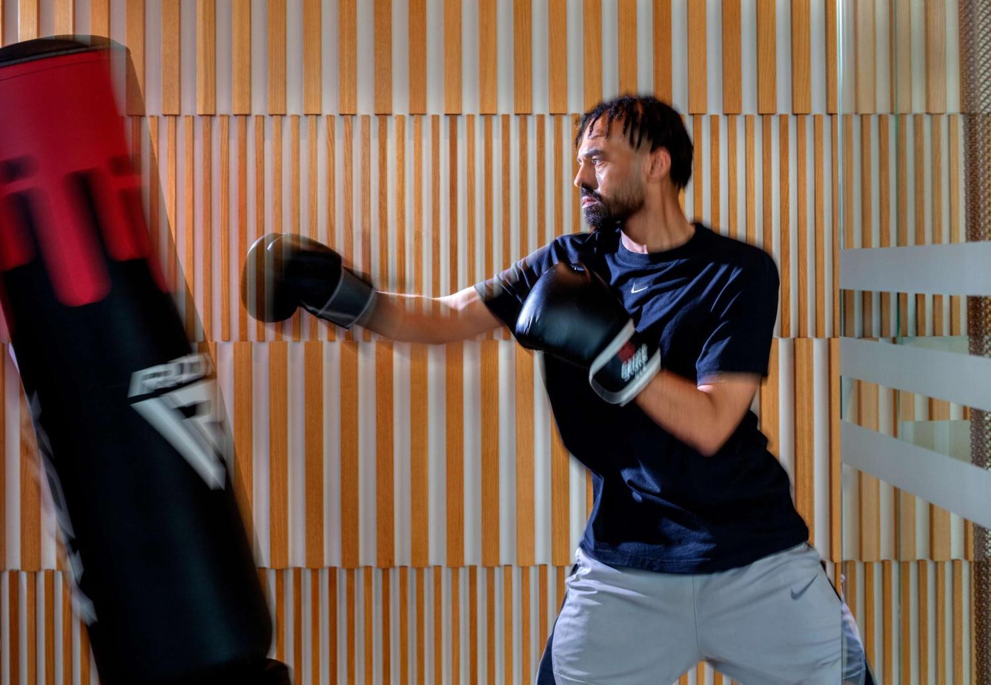 Hyatt Regency Riyadh Olaya Ngoại thất bức ảnh A boxer training with a heavy bag